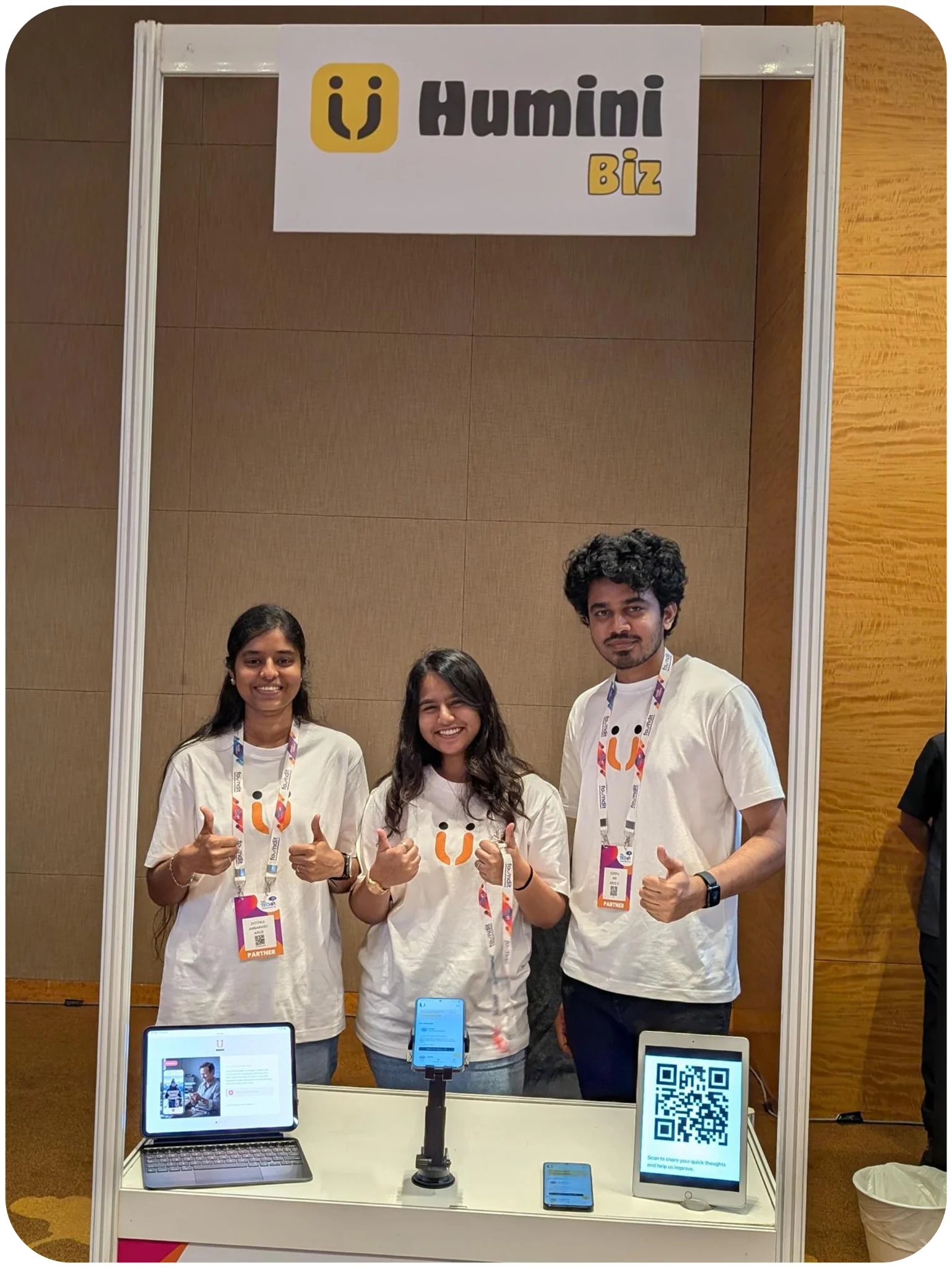 Humini Biz team presenting the product at a Singapore business expo